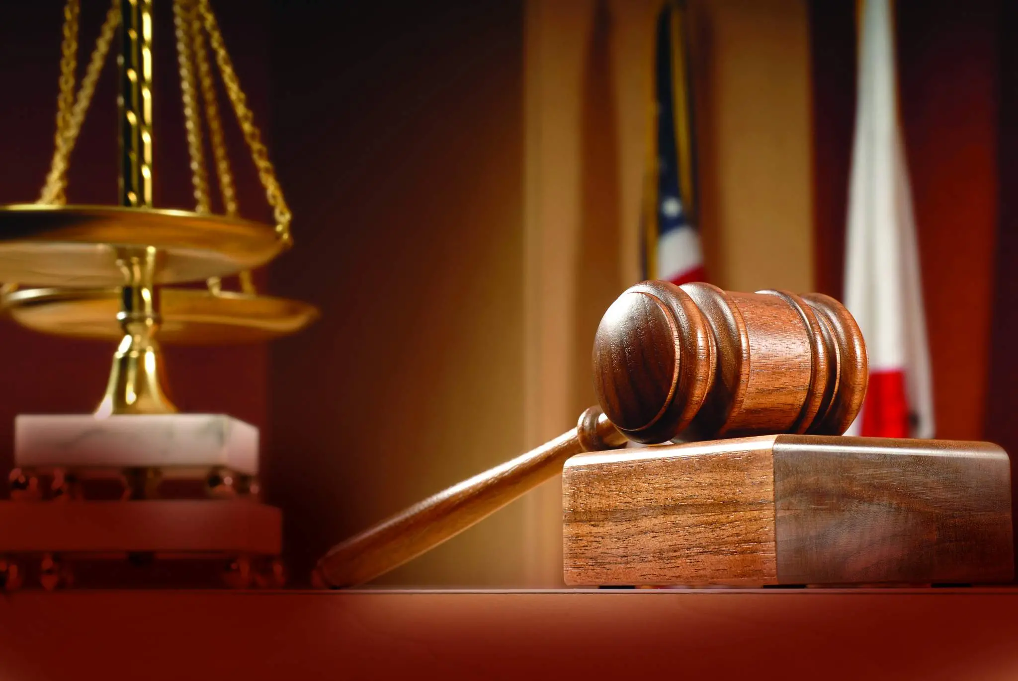 judges gavel next to scales of justice